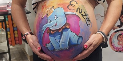 Body painting barriga embarazada Dumbo